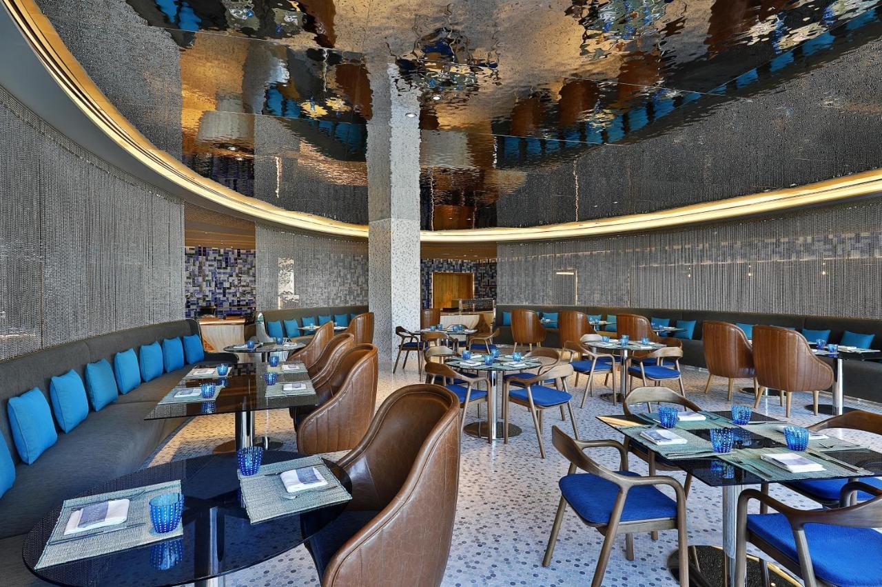 马斯喀特w酒店 外观 照片 The interior of the restaurant